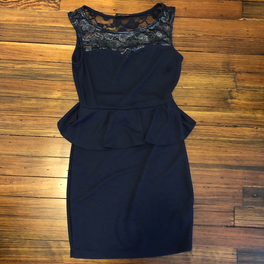 Women’s  peplum dress. Size small.